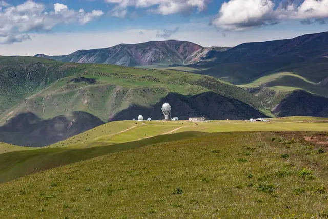 Assy Plateau: assy-Turgen observatory domes on the green rolling Assy plateau, spring