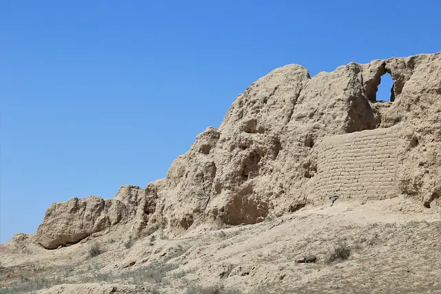 Turkestan: eroded mud-brick walls of the medieval city of Sauran near Turkestan
